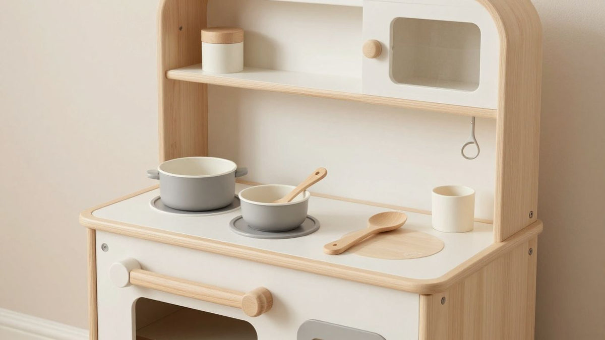 Ferm Living Toro Play Kitchen with wooden accessories.